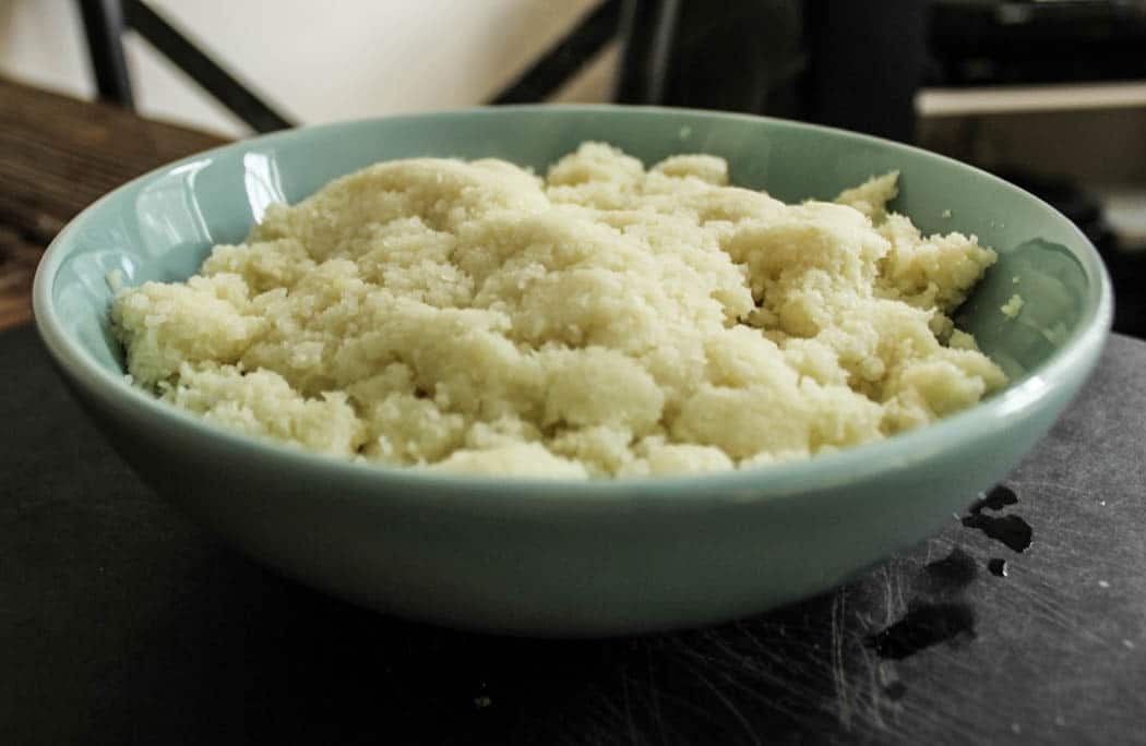 Microwaved cauliflower rice for cauliflower pizza crust.
