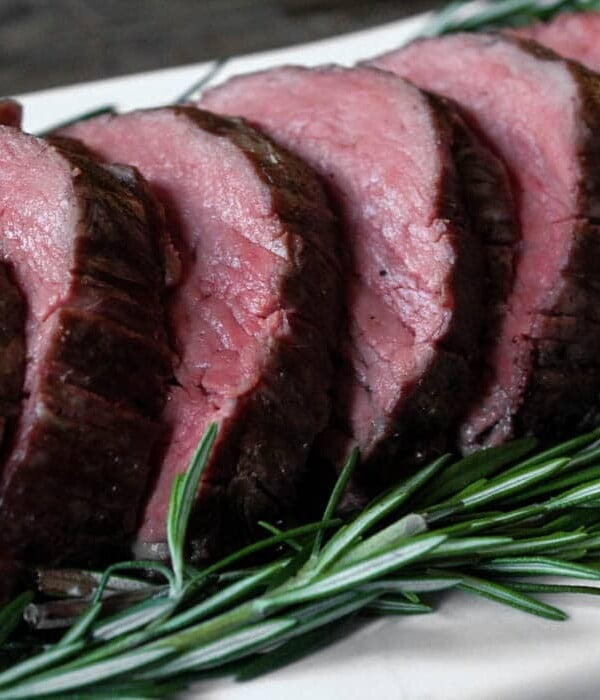 Close up of medium-rare sliced beef tenderloin