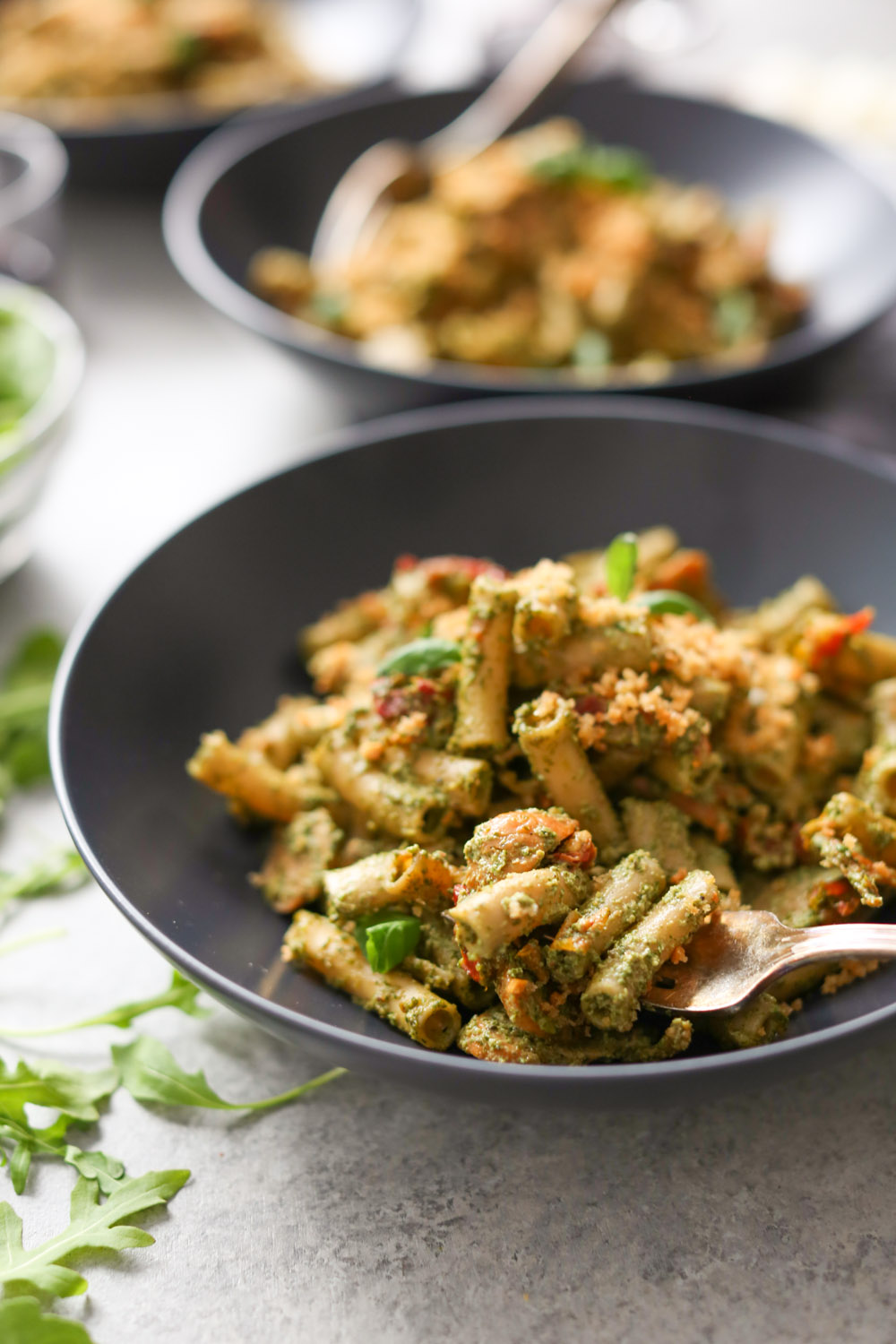 Sausage and Sun-Dried Tomato Pasta with Arugula-Goat Cheese Pesto