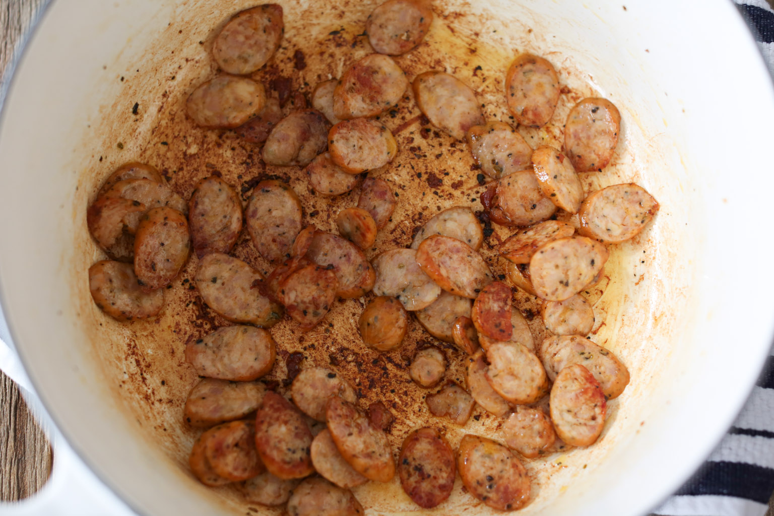 Sausage and Sun-Dried Tomato Pasta with Arugula-Goat Cheese Pesto